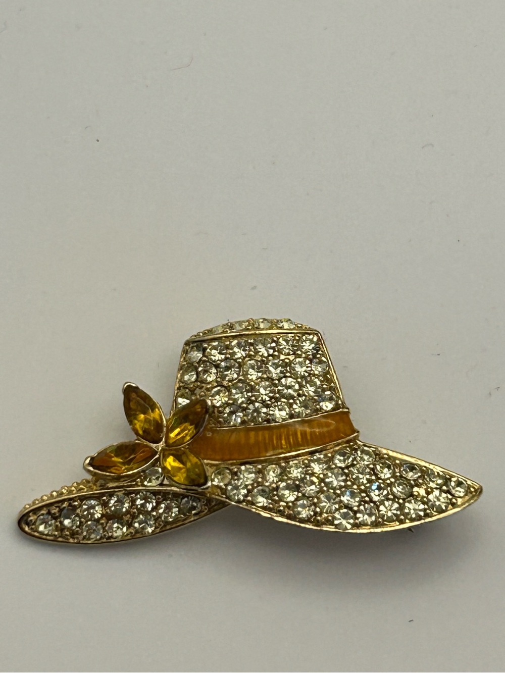 Monet Gold-Tone Crystal Hat Brooch with Yellow Accents